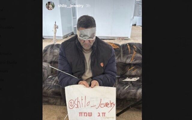 The Instagram story of an Israeli soldier who forced a blindfolded Palestinian detainee in the West Bank to hold up a sign advertising for his jewelry business in April 2026. (Courtesy)